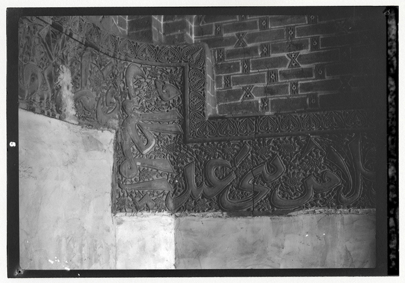 Detail of the stucco inscription in the southwest corner.